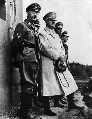 Himmler and Hitler, along with other officers, view live-fire military exercises at the Münsterlager training area, May 20, 1939.