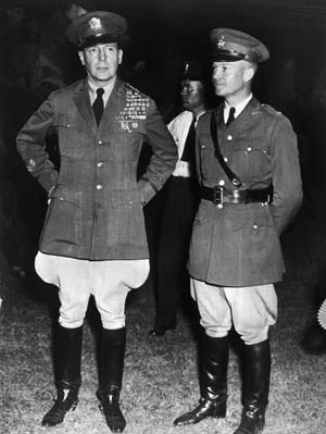 Army Chief of Staff General Douglas MacArthur and his aide, Major Eisenhower, during the “Bonus Army” conflict.