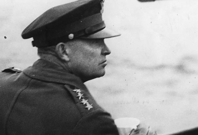 The heavy weight of command is clearly visible on Eisenhower's face as he observes the Normandy invasion beaches on D+1 aboard the British mine layer Apollo. By this time he had already commanded three other major amphibious assaults—the invasions of North Africa, Sicily, and Salerno.