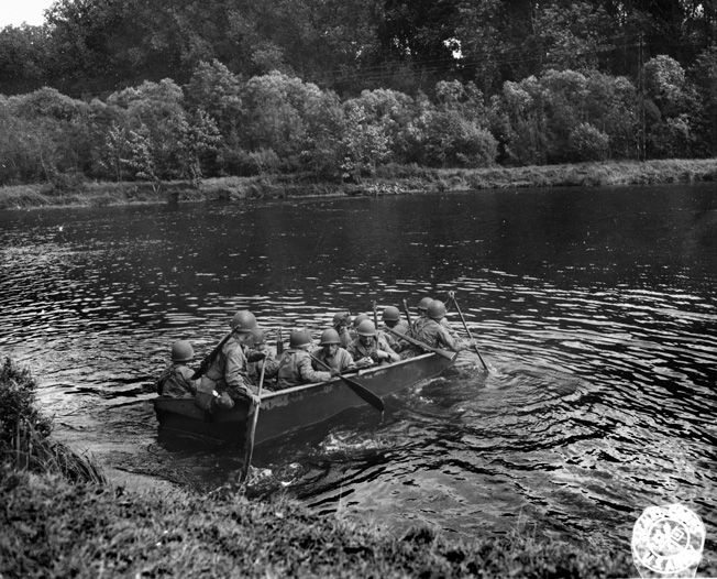 On September 8, men of the 5th Infantry Division cross the Moselle River near Dornot, France, five miles south of Metz.