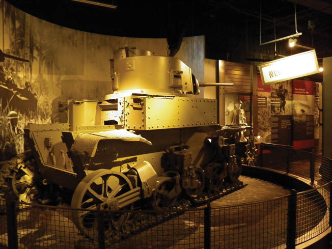 This Australian M-3 Stuart tank was knocked out by a Japanese gun during the battle for the Kokoda Track on New Guinea, May 1942. A video interview with the surviving tank commander adds the human element to the display.