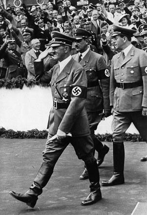 Hitler is accompanied by Albert Speer (right), general building inspector for Berlin, as well as Hermann Esser (center), vice president of the Nazi Reichstag in January 1937.