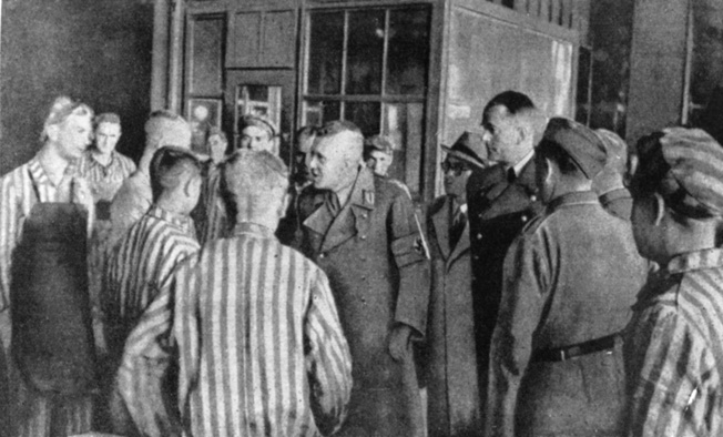 The only image of Speer (fourth from right) visiting a concentration camp (Mauthausen). Speer claimed not to know about the existence of Hitler’s “Final Solution.” 