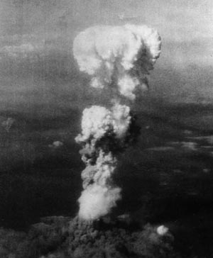 A mushroom cloud billows 20,000 feet above Hiroshima and spreads 10,000 feet from ground zero. The crewmen aboard the Enola Gay were awestruck by the power of the atomic bomb.