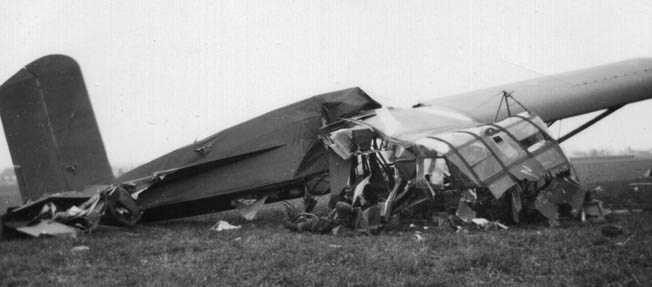 Not all landings were happy ones. Here a CG-4A lies crumpled in a field near Wesel. Many glider troopers were killed or seriously wounded in these crash landings or when enemy antiaircraft fire brought them down. 