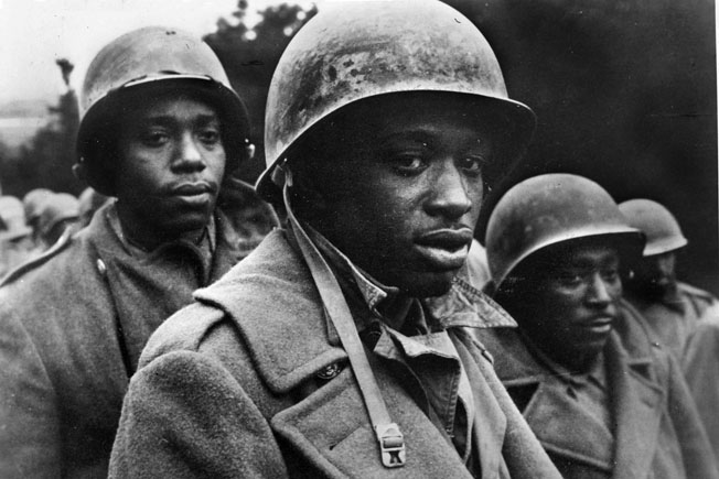 A still frame from a German newsreel showing members of the 333rd after they were captured during the Battle of the Bulge. More than half the members of the battalion were taken prisoner.