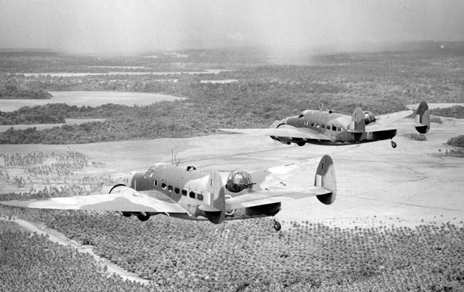 Lockheed Patrol Bomber/Observation (PBO) Hudson aircraft saw widespread use around the world. These PBOs from the New Zealand Observation Group approach Henderson Field on Guadalcanal, May 1943.