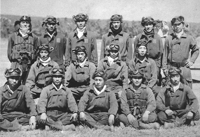 Japanese pilots such as this group, many of whom were battle hardened and experienced after service in China, flew combat missions against the Americans in the skies above Guadalcanal from the huge Japanese base at Rabaul.