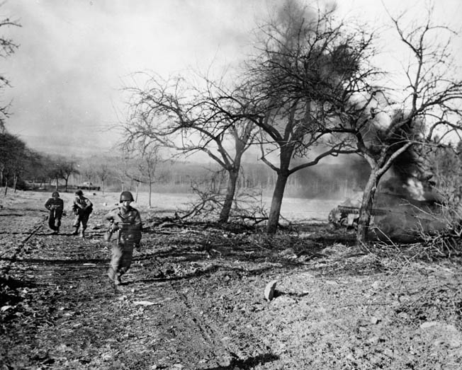 U.S. soldiers advance under fire to the Saar River, February 1945. The Rangers were vital to the 10th Armored Division and 94th Infantry Division’s capture of key German territory.
