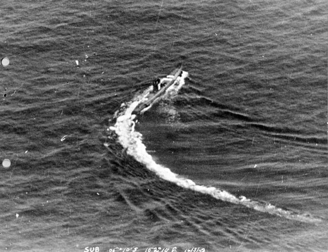 An unidentified Japanese Ro-class submarine takes evasive action on the surface of the Pacific Ocean. American antisubmarine tactics and weaponry took a heavy toll in Japanese submarines during the latter years of World War II.