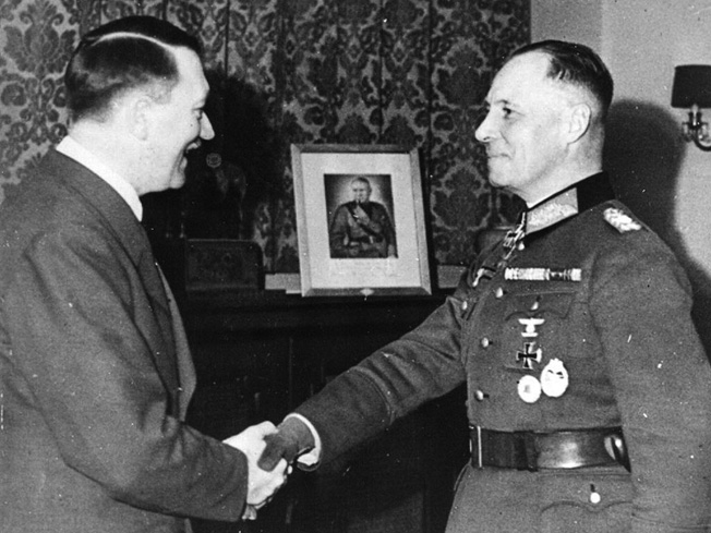 Hitler congratulates Rommel during the awarding of Oak Leaves to go with his Knight’s Cross, March 20, 1942—before Rommel fell out of favor with Hitler. 