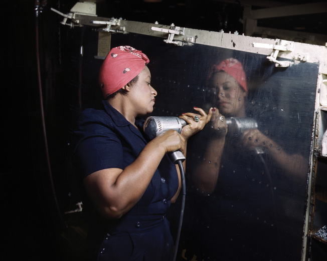 Photographer Alfred Palmer captured another African American “Rosie” operating a power tool while working on an A-31 Vengeance dive bomber at Vultee Aircraft's Nashville, Tennessee, plant.