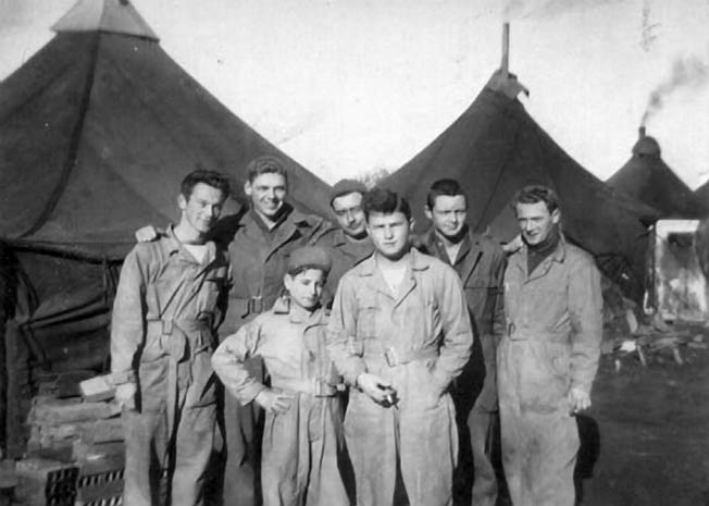 A shot of some members of the B-24 crew at their base in Cerignola, shortly before the plane was shot down. Thomas Rowe is at far right.