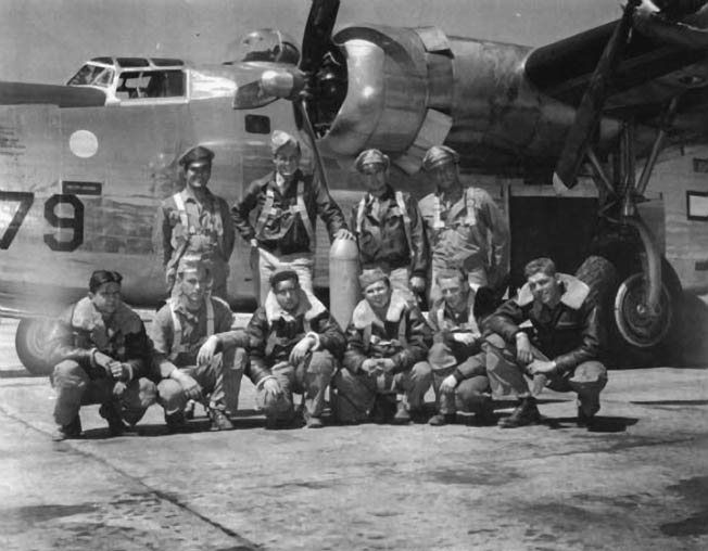 The crew of Rowe’s B-24 (back row, left to right): Francis Deans, bombardier; Robert Crinkley, pilot; James Owens, co-pilot; Nathan Berliner, navigator. (Front row, kneeling): Rufus Breland, nose gunner; Wilbur Penno, radio operator; James Shipman, tail gunner; Walter Wright, belly-turret gunner; Thomas Rowe, flight engineer; Edwin Hand, top-turret gunner.