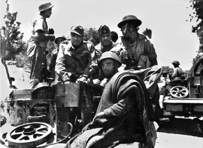 Men of the 6th Battalion, Durham Light Infantry, with some of their Italian prisoners. In most places the Italians surrendered quickly, leaving the fighting to their German partners. The DLI would also be involved in the battle for the Primosole Bridge.