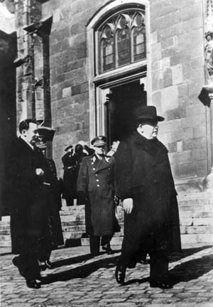 On March 20, 1944, during observances of the fifth anniversary of the Nazi occupation of Czechoslovakia, Father Tiso leaves a Czech cathedral. 