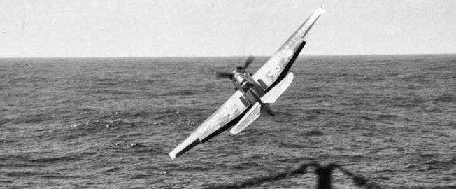 A Grumman TBF Avenger torpedo bomber spun into the Pacific Ocean seconds after launch.