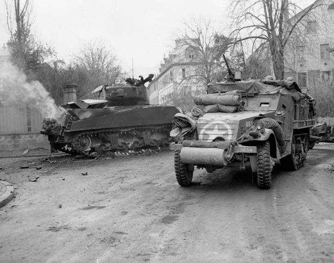 After Creamer lost the spring from his .30-caliber machine gun in Weisweiler, he scavenged the part he needed from a machine gun in a knocked-out Sherman tank, like the one shown here.