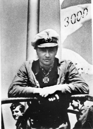 Captain Johann Mohr of U-124 is shown wearing the Knight’s Cross at his throat. On a single night during Operation Drumbeat, Mohr successfully torpedoed four tankers and a steamer sailing in an unescorted convoy.