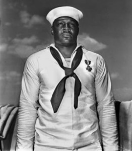 Seaman Doris Miller was serving as a mess attendant aboard the battleship on that fateful morning but helped carry his mortally wounded captain to temporary safety and manned a machine gun, firing at the low-flying attackers.