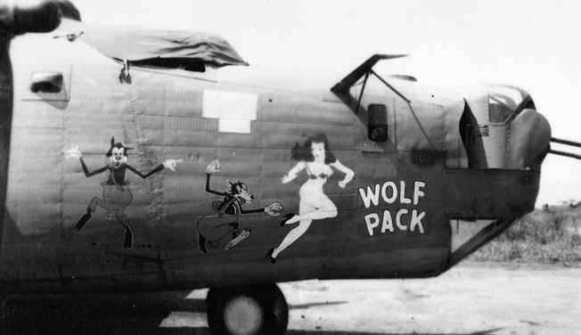 "Wolf Pack” was one of the B-24 Liberator bombers flown by Lieutenant Herbert Goodrich. Note the distinctive nose art and the twin .50-caliber machine guns in the nose that were used to defend against Japanese fighter planes. 