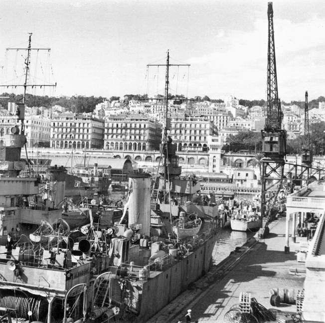 WWII: ALGIERS, 1942. View of the docks in Algiers, one week after the landing of British and American forces. Photograph, 16 November 1942.