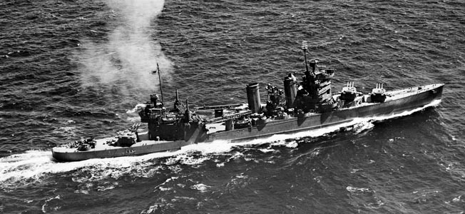 The Astoria test fires her 8-inch guns off Hawaii on July 8, 1942, a month before the Guadalcanal action.