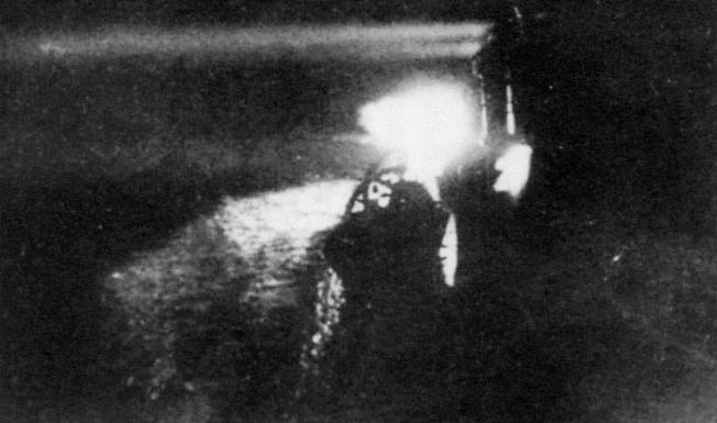 A searchlight aboard the Japanese cruiser Yubari scans the blackness near Savo Island for targets. The Japanese were well trained in night fighting and utilized the superb Long Lance torpedo to deadly effect during the battle.