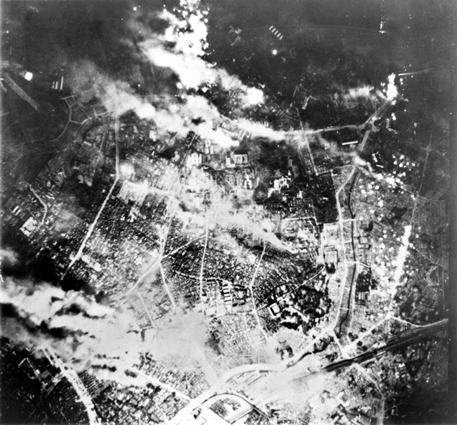 Tokyo burns fiercely following one of numerous American firebomb raids. This attack was conducted in May 1945, two months after the devastating raid of March 9-10. 