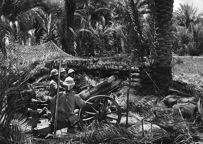 The Middle East during WW2 was a region of strong Allied resistance. Here, an Iraqi rebel gun crew shells British positions near Ramadi.