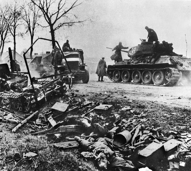 Soviet troops at the eastern boundary of Berlin, Germany, near the end of World War II in Europe. Photograph, 22 April 1945.