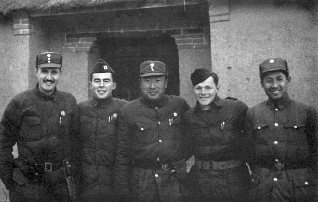 Lt. John Birch (second from left) and a pair of fellow Americans pose with officers of the Chinese Army.