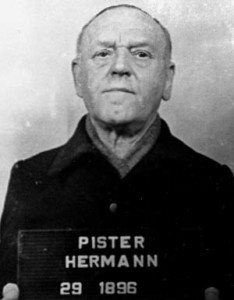 An expressionless Herman Pister, the second and final commandant at Buchenwald, was photographed by American military police following his capture.