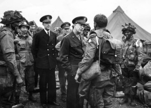 General Dwight D. Eisenhower speaks to paratroopers of the 101st Airborne Division before their jump into Normandy. Eisenhower delayed the invasion of Europe for one day to provide better weather conditions for the airborne drop.