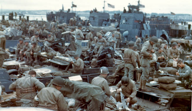 American amphibious forces, packed elbow to elbow, wait for the “go” word from General Eisenhower, who knew he could not keep the men aboard their ships indefinitely. 