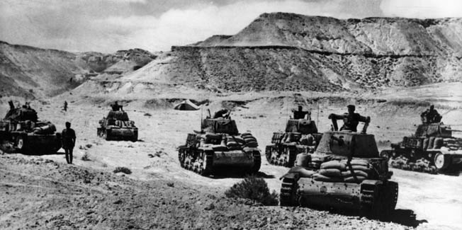Italian tanks move forward in the vicinity of the Qattara Depression during the advance to El Alamein in the autumn of 1942. 
