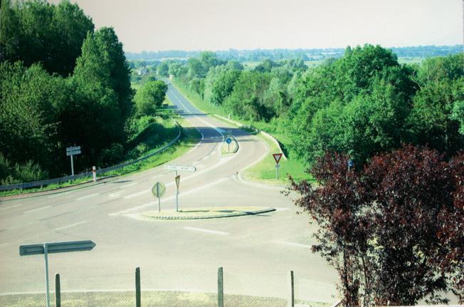 This modern view of Purple Heart Lane looking south from Dead Man's Corner at St. Comte du Mont bellies the violent fighting that took place near the town of Carentan in June 1944.