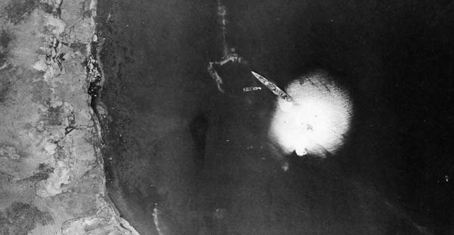 A bomb explodes near a Japanese warship off Kiska Island during raid by U.S. Army Air Force bombers, October 9, 1942.