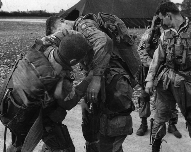 Prior to their D-day jump into Normandy, members of the 82nd Airborne check over their gear. Like the 101st, the 82nd was spread out over miles of Norman countryside in the pre-dawn darkness of June 6, 1944. 