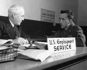 After an orientation lecture, Faulkner receives help and information on employment after his discharge.