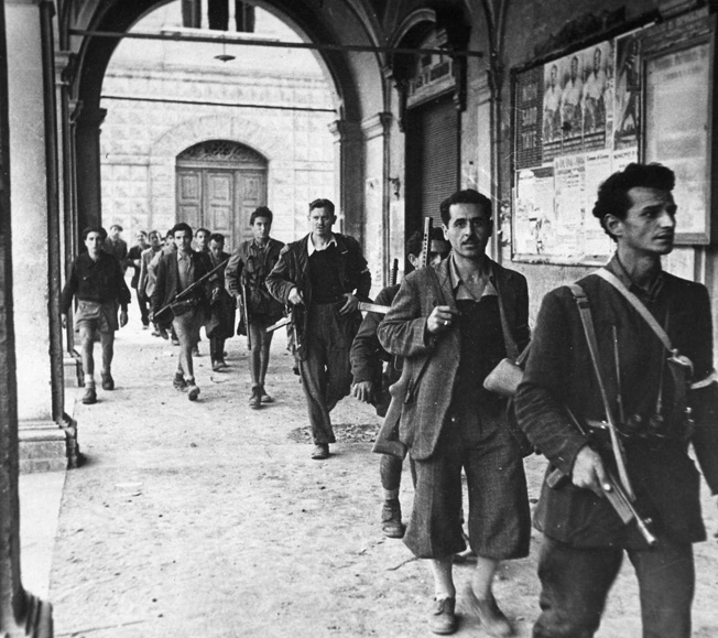 A group of Greek partisans searches for remaining Nazis in a Greek town. 