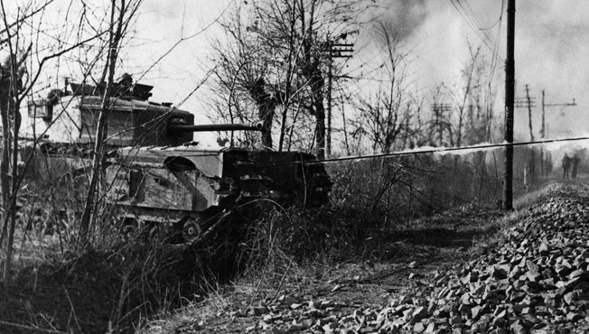 The Crocodile, a Churchill tank modified to employ a flamethrower and tow its own tank of flammable liquid, was utilized in Normandy against fixed German positions. The Crocodile was capable of spewing its flames a distance of 120 feet.