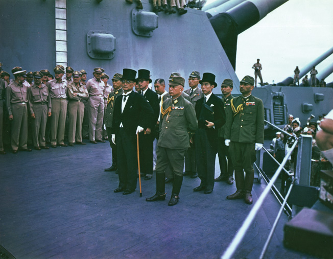 The Japanese delegation during the surrender proceedings aboard the battleship USS Missouri on September 2, 1945, included Foreign Minister Mamoru Shigemitsu and Army Chief of Staff Yoshijiro Umezu (front, left to right). Behind them stand, left to right, Major General Yatsuji Nagai of the Imperial Japanese Army, Katsuo Okazaki of the foreign ministry, Rear Admiral Tadatoshi Tomioka of the Imperial Japanese Navy, Toshikazu Kase of the foreign ministry, and Lieutenant General Suichi Miyakazi of the Imperial Japanese Army.
