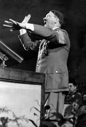 Berlin, Germany: 1936. Adolf Hitler during his speech at the opening of the Winter Relief Organization in 1936 in the Berlin Sports Palace. ©SZ Photo / Scherl / The Image Works This image has been manually retouched by the original source NOTE: The copyright notice must include "The Image Works" DO NOT SHORTEN THE NAME OF THE COMPANY