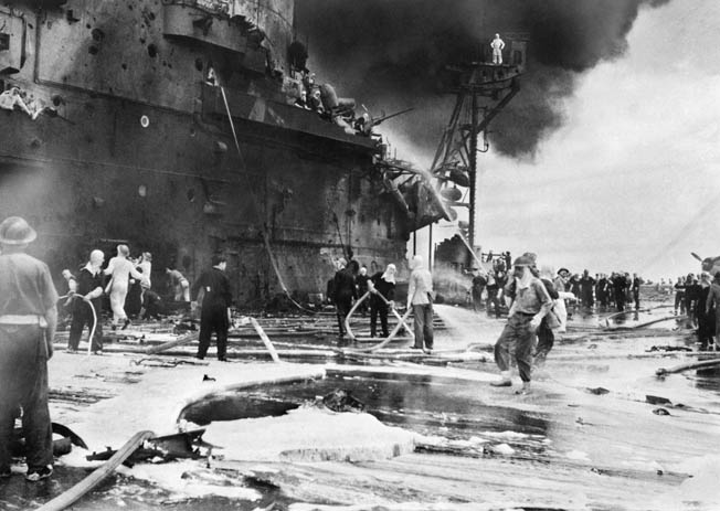 Ferocious attacks by Japanese planes took a heavy toll in lives and damaged dozens of U.S. Navy vessels during operations to capture the island.