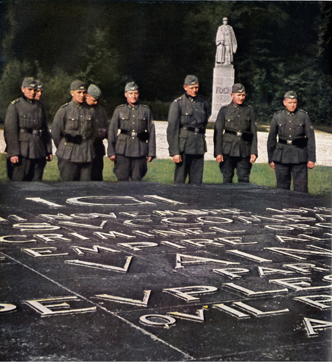 Germans inspect the French memorial at Compiegne, the site of Germany's surrender in 1918. Hitler demanded that French forces surrender at the same site, in the same railway car used in 1918.