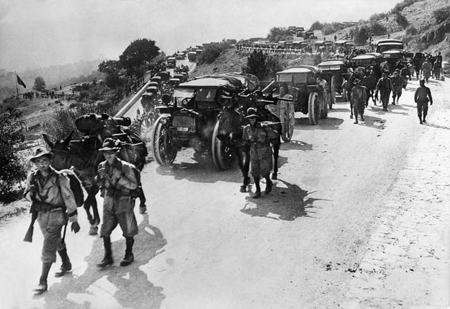 This photo was taken around June 25, 1940, and depicts Italian troops on the move into the high mountains along the border with France. These specially trained mountain troops reached their objective and held it after the armistice was concluded.