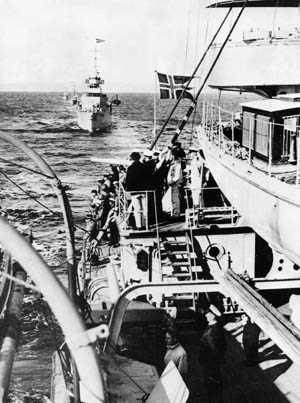 Fast, modern Norwegian cruisers patrol the Norwegian coastline in early April 1940.