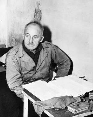 Nazi Julius Streicher, publisher of the virulently anti-Semitic newspaper Der Sturmer, stares blankly from inside his cell. He was one of the most bizarre and perverse of the high-ranking Nazis on trial at Nuremberg. 