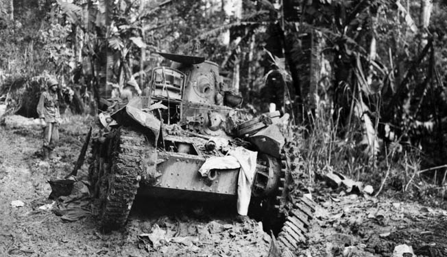 A Japanese medium tank lies knocked out and abandoned after a firefight in the Philippines. The Japanese lagged behind other major world military powers in the development of armor, and much of the terrain where combat occurred in the Pacific was ill-suited for the deployment of tanks. 